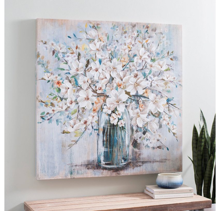 white flowers in blue vase